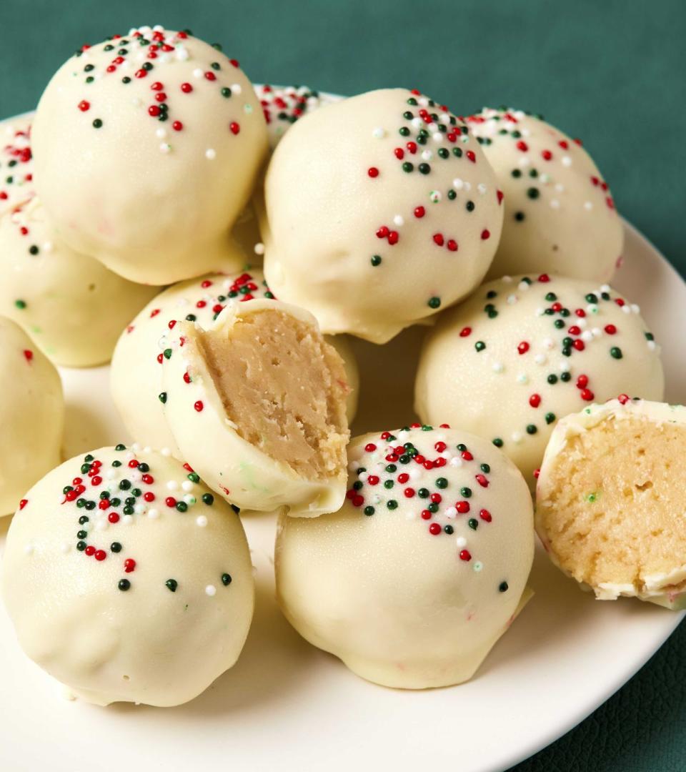 <p>Got an excess of holiday sugar cookies? This is the BEST way to use them, even if they're iced. If you don't have extra <a href="https://www.delish.com/cooking/recipe-ideas/recipes/a50502/basic-sugar-cookies-recipe/" rel="nofollow noopener" target="_blank" data-ylk="slk:sugar cookies;elm:context_link;itc:0;sec:content-canvas" class="link ">sugar cookies</a>, bake some off! The easiest route is to buy store-bought cookie dough, but if you have a recipe you love, go for it. The truffles will be even better for it.</p><p>Get the <strong><a href="https://www.delish.com/cooking/recipe-ideas/a24856051/sugar-cookie-truffles-recipe/" rel="nofollow noopener" target="_blank" data-ylk="slk:Sugar Cookie Truffles recipe;elm:context_link;itc:0;sec:content-canvas" class="link ">Sugar Cookie Truffles recipe</a></strong>.</p>