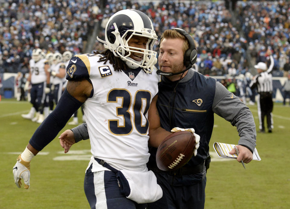 Rams running back Todd Gurley is congratulated by coach Sean McVay after Gurley scored a touchdown against the Titans. (AP)