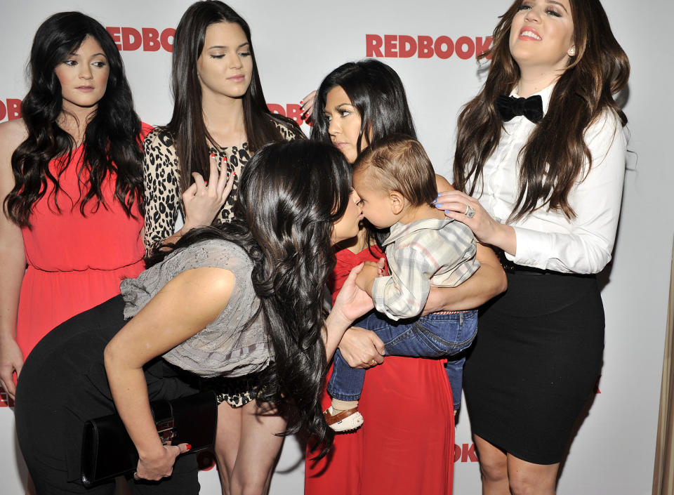 WEST HOLLYWOOD, CA - APRIL 11: Kim Kardashian kisses nephew Mason Disick as Redbook celebrates first ever family issue with the Kardashians held at The Sunset Tower Hotel on April 11, 2011 in West Hollywood, California. (Photo by Toby Canham/Getty Images)