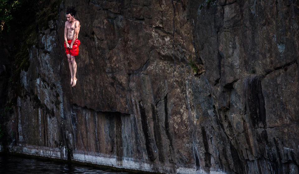 Hot summer day at flooded granite quarry