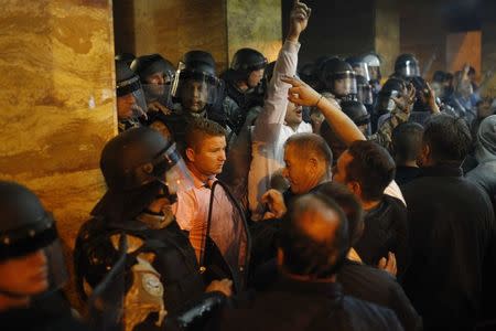 Demonstrators storm into Macedonia's parliament in Skopje. Macedonia April 27, 2017. REUTERS/Ognen Teofilovski