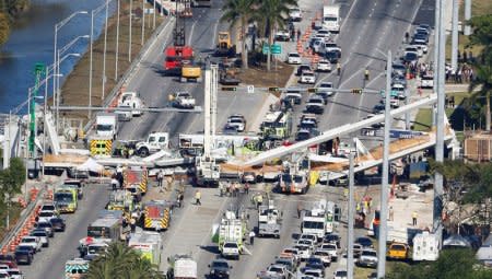 Aerial view shows a pedestrian bridge collapsed at Florida International University in Miami, Florida, U.S., March 15, 2018.  REUTERS/Joe Skipper