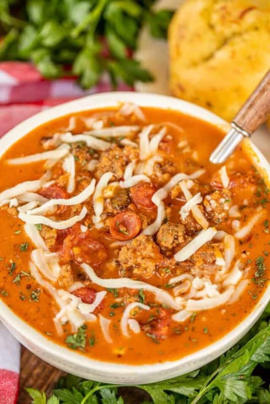 <p>Plain Chicken</p><p>Creamy tomato soup loaded with sausage and pepperoni. YUM!</p><p><strong>Get the recipe: <a href="https://www.plainchicken.com/slow-cooker-pizza-soup/" rel="nofollow noopener" target="_blank" data-ylk="slk:Slow Cooker Pizza Soup;elm:context_link;itc:0;sec:content-canvas" class="link ">Slow Cooker Pizza Soup</a></strong></p>