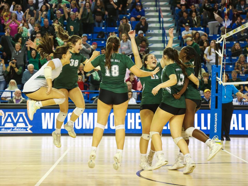 Tower Hill celebrates the final point of its 3-0 state volleyball championship win over St. Mark’s at the Bob Carpenter Center, Nov. 14, 2022.
