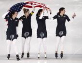 Speed Skating - Pyeongchang 2018 Winter Olympics - Women's Team Pursuit Competition Finals - Gangneung Oval - Gangneung, South Korea - February 21, 2018. Heather Bergsma, Brittany Bowe, Mia Manganello and Carlijn Schoutens of the U.S celebrate winning bronze. REUTERS/Damir Sagolj