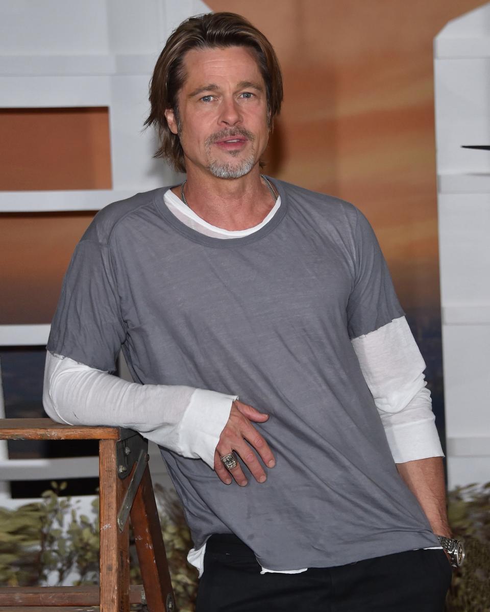 In Brad Pitt's hands, the humble short-sleeve-over-long-sleeve look becomes a #BigFitoftheDay.