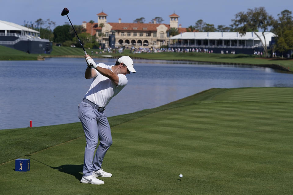 Rory McIlroy, of Northern Ireland, hits from the 18th tee during the first round of the Players Championship golf tournament Thursday, March 9, 2023, in Ponte Vedra Beach, Fla. (AP Photo/Charlie Neibergall)