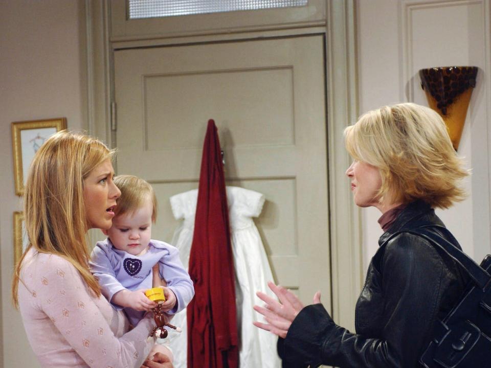 Noelle and Cali Sheldon on "Friends" set with Aniston and guest-star Christina Applegate.