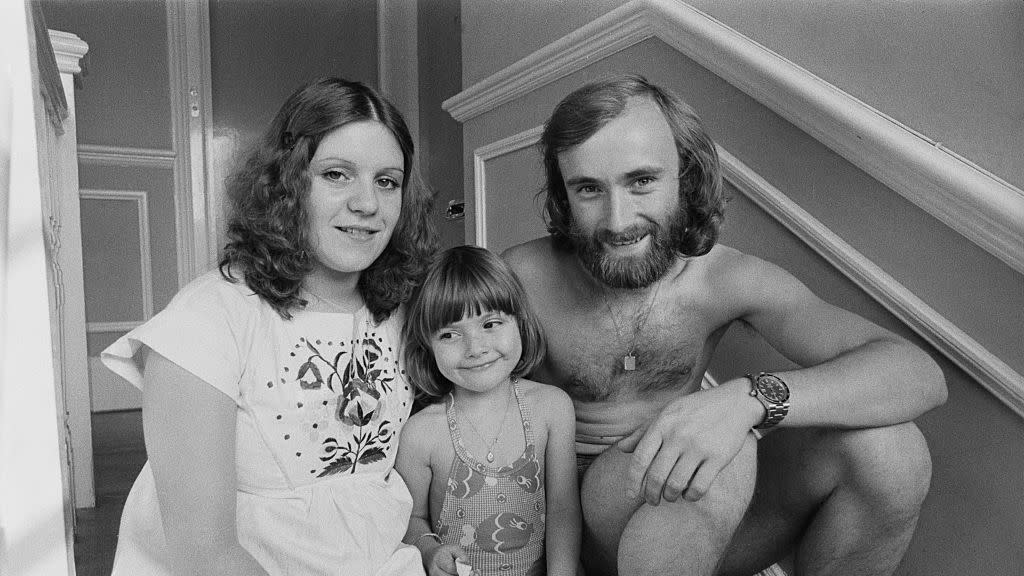 phil collins sitting to the right of his ex wife andrea bertorelli and their daughter