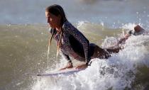 Inspired by Brazil's gold medalist Italo Ferreira, 12-year-old Maria Clara, surfs the waves and dreams of an Olympic career