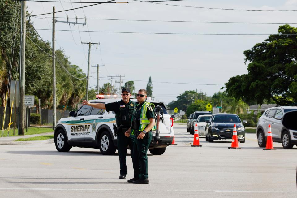 Police officers direct traffic near Trump International Golf Club after the apparent assassination attempt of Republican presidential nominee former President Donald Trump in West Palm Beach, Fla., Sunday, Sept. 15, 2024 (AP)