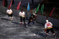 The Wider Image: On a frozen pond far from the Olympics, meet China's ice hockey veterans