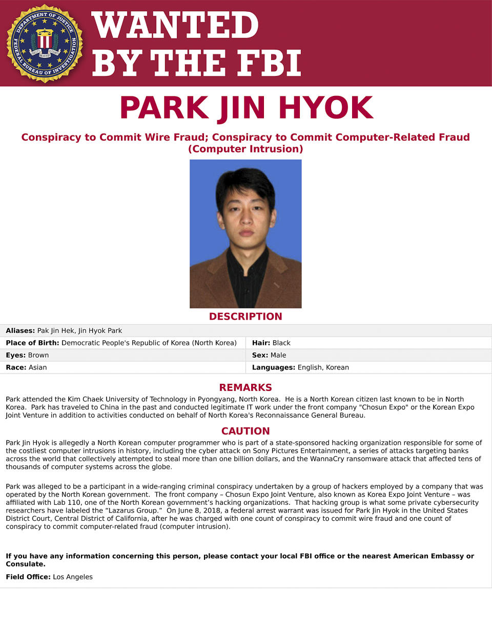 This wanted poster released by the FBI shows a photo of Park Jin Hyok. Hyok, a computer programmer accused of working at the behest of the North Korean government, was charged Thursday, Sept. 6, 2018, in connection with several high-profile cyberattacks, including the Sony Pictures Entertainment hack and the WannaCry ransomware virus that affected hundreds of thousands of computers worldwide. (FBI via AP)