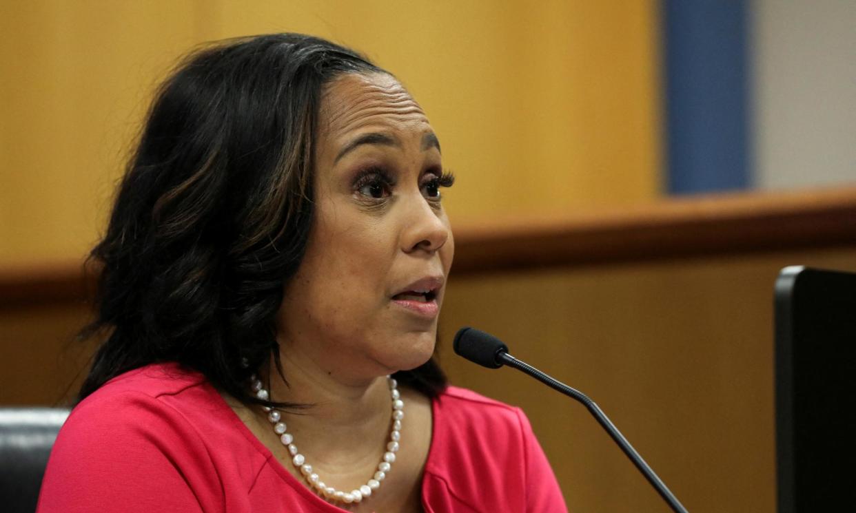 <span>Fani Willis, the district attorney for Fulton county, speaks in court on Thursday.</span><span>Photograph: Alyssa Pointer/Reuters</span>