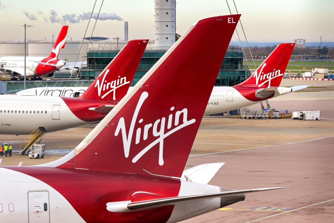 London, England, UK - 30 November 2023: Tail fins of Virgin Atlantic Airways jets at London Heathrow airport.