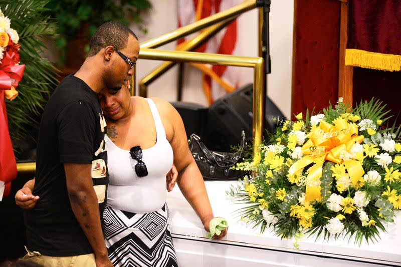 FILE PHOTO: Emerald Garner mourns next to the coffin of her father Eric Garner during his funeral at Bethel Baptist Church in Brooklyn New York