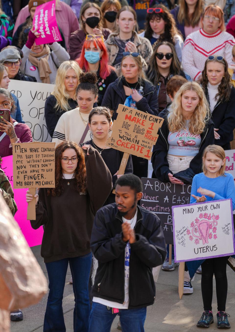 More than 100 people listened during the rally prior to the march for abortion rights Wednesday, May 4, 2022, at Red Arrow Park in downtown Milwaukee. \