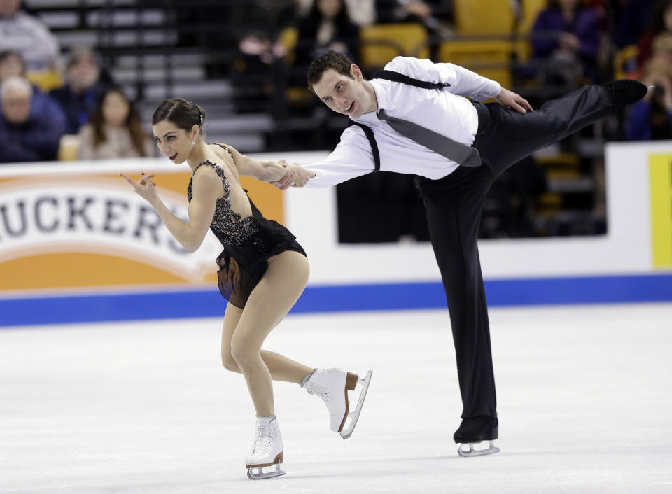 Marissa Castelli and Simon Shnapir compete during the pairs free skate at the U.S. Figure Skating Championships Saturday, Jan. 11, 2014 in Boston. (AP Photo/Steven Senne)