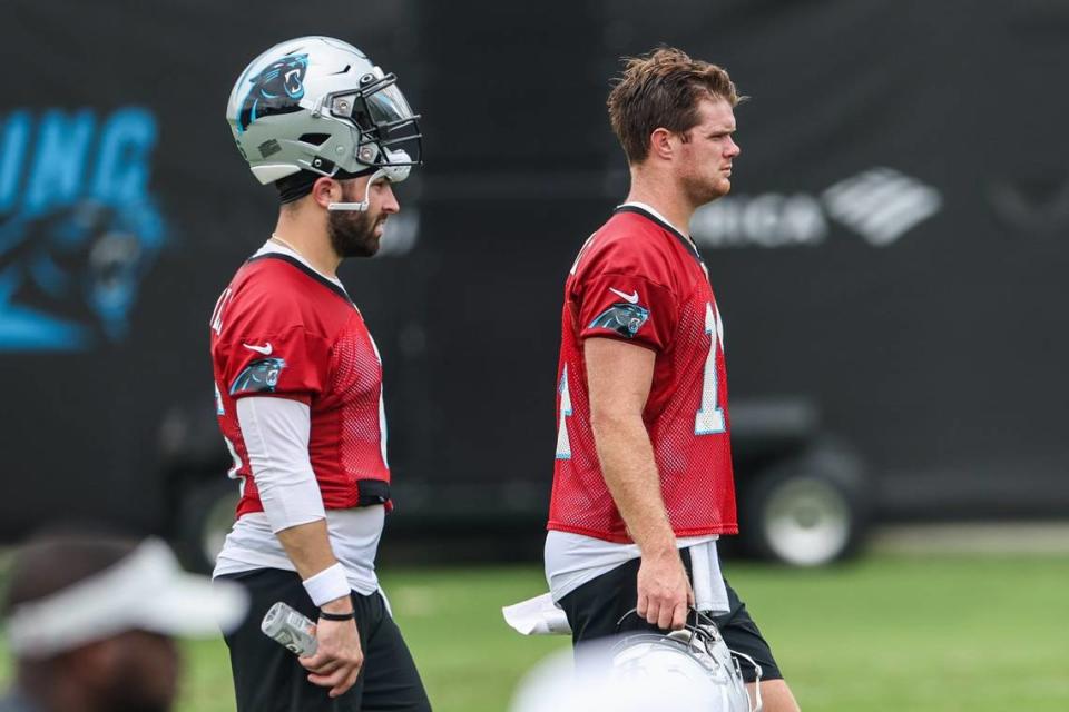 Panthers quarterback Baker Mayfield, left, and Sam Darnold at a training camp practice.