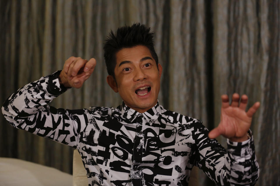 In this Friday, Jan. 10, 2014 photo, Hong Kong veteran actor and performer Aaron Kwok speaks during an interview in Hong Kong. Kwok says he brought out a softer side of a classic villain, the Bull Demon King. Kwok plays the character in the new 3-D fantasy film, "The Monkey King." He joins a stellar ensemble cast that includes other A-listers like Donnie Yen, Chow Yun Fat, and Kelly Chan. (AP Photo/Kin Cheung)