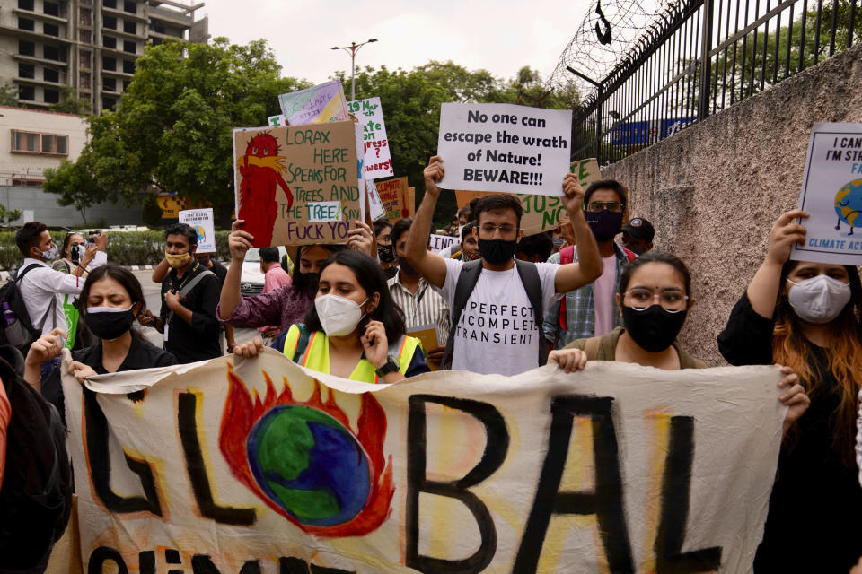 Image: Activists protest in New Delhi, India, on Friday. (Manish Swarup / AP)