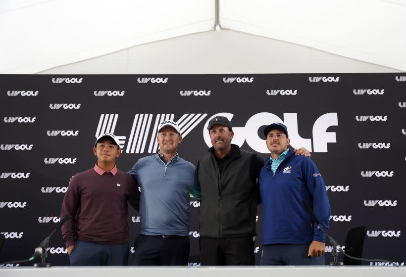 Phil Mickelson, 2nd right, and his Hy Flyers team, Justin Harding, 2nd left, Ratchanon Chantananuwat, left, and Chase Koepka attend a press conference at the Centurion Club, Hertfordshire, England, ahead of the LIV Golf Invitational Series, Wednesday June 8, 2022. (Steven Paston/PA via AP)