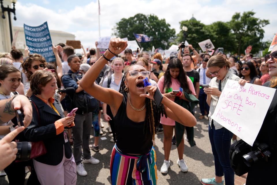 Demonstrators react outside the Supreme Court on June 24, 2022 after the decision in Dobbs v. Jackson Women's Health Organization overturning the landmark 1973 Roe v. Wade decision that established a constitutional right to abortions.