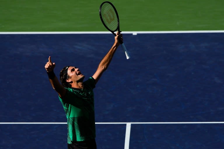 Roger Federer of Switzerland celebrates after defeating compatriot Stan Wawrinka in the ATP Indian Wells final match, in California, on March 19, 2017