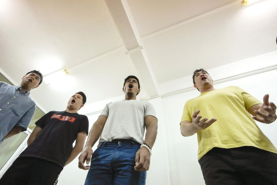 Members of The Bangkok Gay Men's Chorus practice singing during a lesson in Bangkok, Thailand, Sunday, Nov. 26, 2023. Thailand's Parliament is set to debate Thursday, Dec. 21, a final cabinet-endorsed draft bill to pass landmark legislation allowing members of the LGBTQ+ community to get married. (AP Photo/Sakchai Lalit)