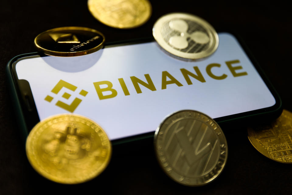 Binance logo displayed on a phone screen and representation of cryptocurrencies are seen in this illustration photo taken in Krakow, Poland on June 28, 2021 (Photo by Jakub Porzycki/NurPhoto via Getty Images)