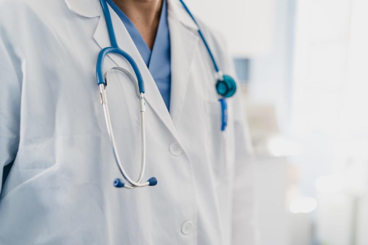 close up of a doctor's gown with stethoscope