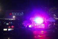 Authorities are pictured at the Cascade Mall following reports of an active shooter in Burlington, Washington, U.S. September 23, 2016. REUTERS/Matt Mills McKnight