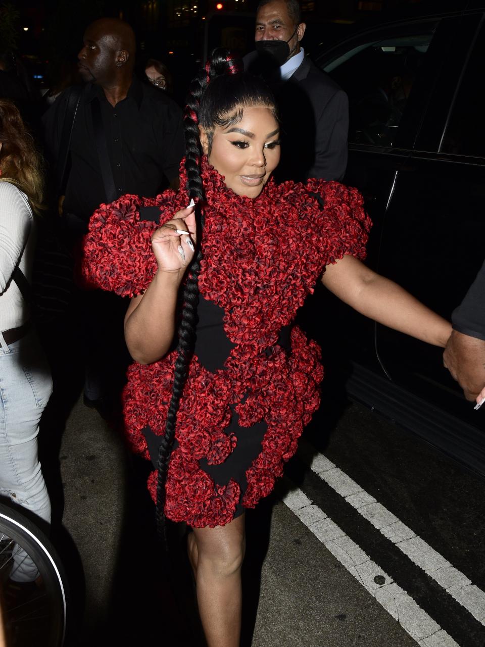 Lil’ Kim leaves Gotham Hall after attending Christian Siriano’s Spring 2022 fashion show. - Credit: MEGA