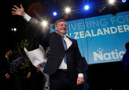 New Zealand Prime Minister Bill English waves to supporters during an election night event in Auckland, New Zealand, September 23, 2017. REUTERS/Nigel Marple