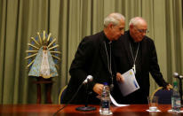 Buenos Aires' Archbishop Cardinal Mario Poli and Jose Maria Arancedo, Santa Fe's Archbishop and President of the Episcopal Conference of Argentina leave after a news conference where they talked about the Vatican's declassification of documents related to Argentina's last military dictatorship in Buenos Aires, Argentina, October 25, 2016. REUTERS/Marcos Brindicci