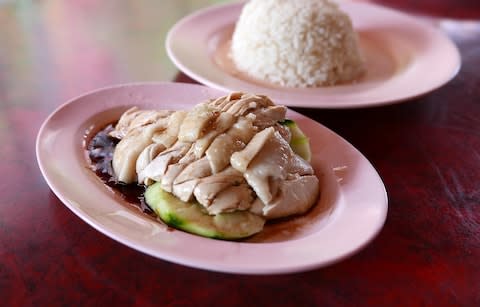 Hainanese chicken rice in Singapore - Credit: Getty