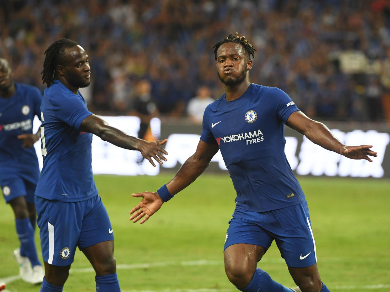 Michy Batshuayi celebrates scoring for Chelsea: Getty