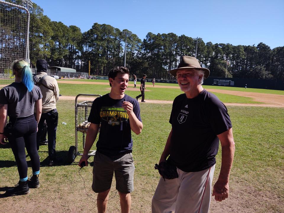 Former major league pitcher Bill Lee, 75, is interviewed by Savannah Bananas broadcast entertainer Biko Skalla during tryouts for the Premier Team on Saturday at Grayson Stadium. Lee, a left-hander who played 14 years in the big leagues and was an All-Star for the Boston Red Sox in 1973, made the professional travel team's roster as a "player/entertainer."