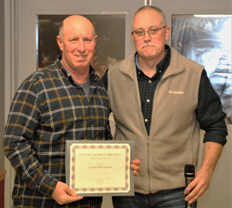 Capt. Mike Russell, left, is the 2022 Firefighter of the Year for the Fort Morrow Fire District. Former Chief Kevin Edington, right, presented Russell with the award during the annual dinner held Saturday, Jan. 21, 2023, at the fire hall in Waldo.