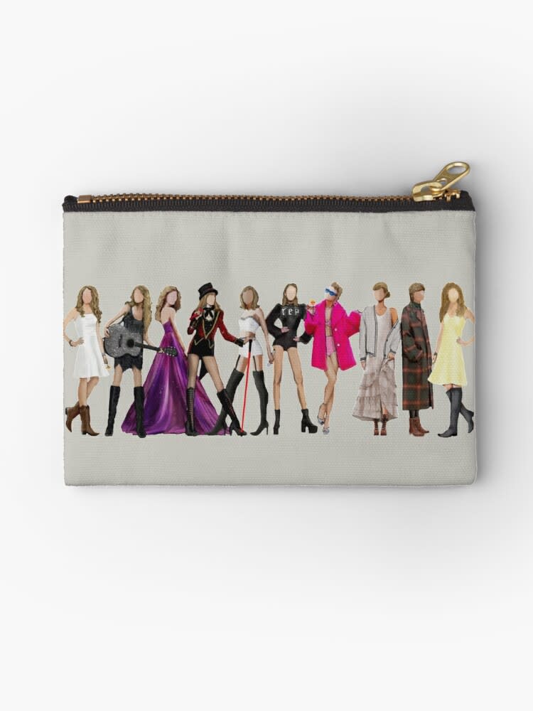 <p><a href="https://go.redirectingat.com?id=74968X1596630&url=https%3A%2F%2Fwww.redbubble.com%2Fi%2Fpouch%2FTaylor-S-Eras-Fan-Art-by-PamAraico%2F78500158.440R3&sref=https%3A%2F%2Fwww.goodhousekeeping.com%2Fholidays%2Fchristmas-ideas%2Fg45433597%2Fbest-taylor-swift-gifts%2F" rel="nofollow noopener" target="_blank" data-ylk="slk:Shop Now;elm:context_link;itc:0;sec:content-canvas" class="link rapid-noclick-resp">Shop Now</a></p><p>Taylor Through the Eras Zipper Pouch</p><p>redbubble.com</p><p>$13.87</p><span class="copyright">Redbubble @PamAraico</span>