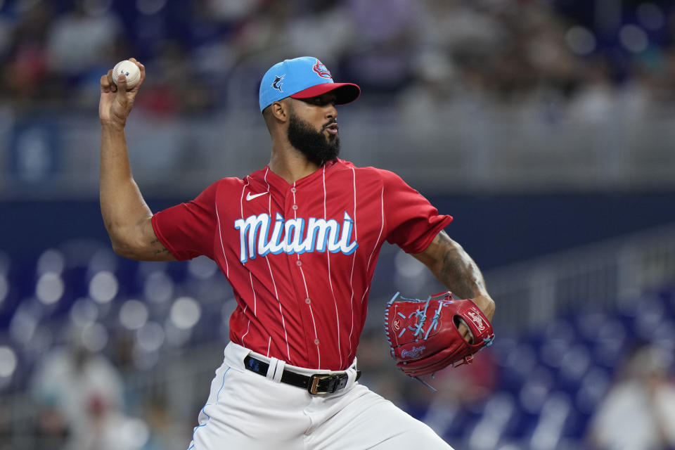 Miami Marlins' Sandy Alcantara delivers a pitch during the first inning of a baseball game against the Cincinnati Reds, Saturday, May 13, 2023, in Miami. (AP Photo/Wilfredo Lee)