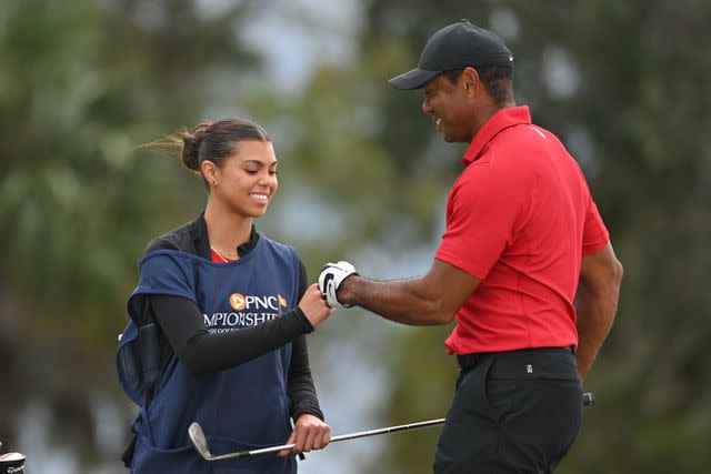 <p>Ben Jared/PGA TOUR via Getty</p> Sam Woods and Tiger Woods