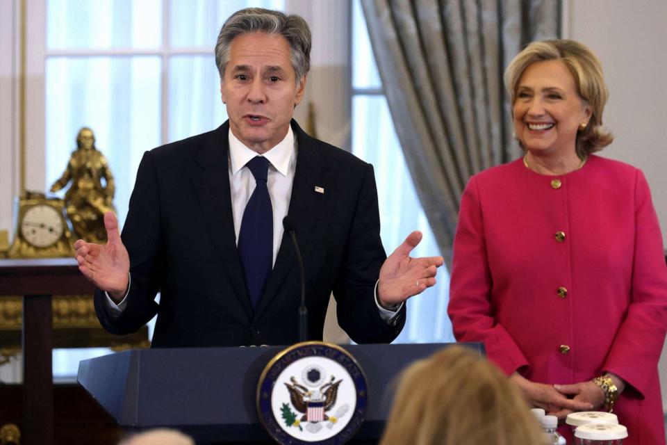 PHOTO: Secretary of State Antony Blinken speaks as former Secretary of State Hillary Clinton listens during an unveiling of her portrait at the State Department, Sept. 26, 2023 in Washington, DC. (Alex Wong/Getty Images)