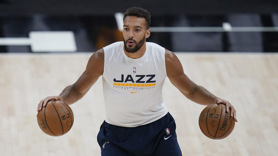 Utah Jazz center Rudy Gobert warms up before Game 1 of the team's second-round NBA basketball playoff series against the Los Angeles Clippers on Tuesday, June 8, 2021, in Salt Lake City. (AP Photo/Rick Bowmer)