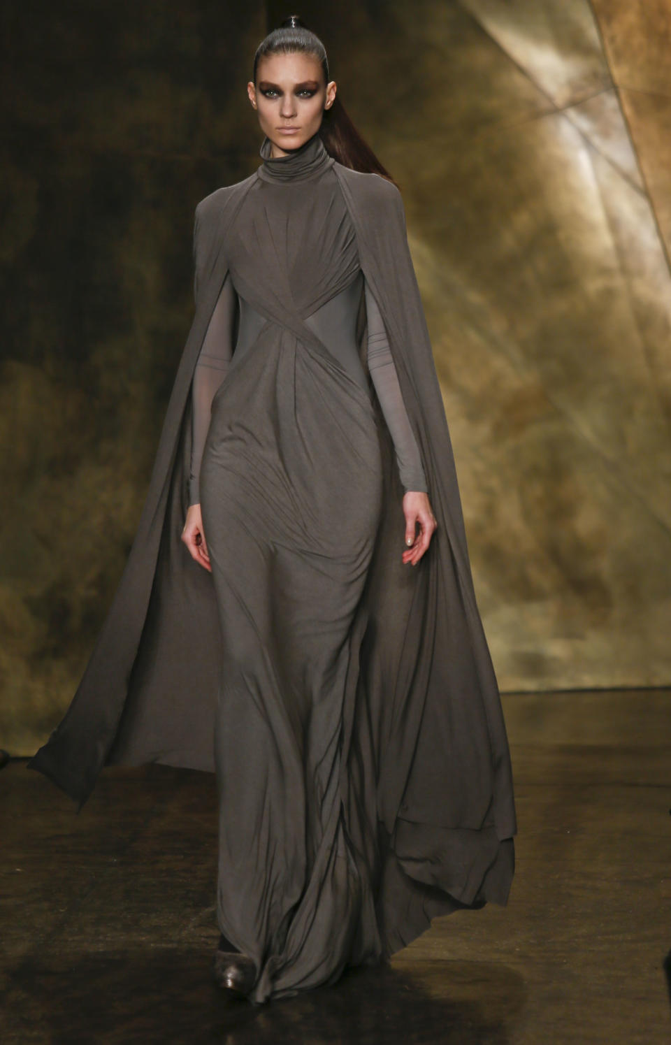 Fashion from the Fall 2013 collection of Donna Karan New York is modeled on Monday, Feb. 11, 2013 in New York. (AP Photo/Bebeto Matthews)