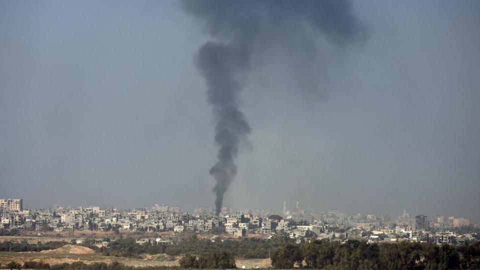 PHOTO: Smoke billows over central Gaza following Israeli strikes, Jan. 1, 2024, amid the ongoing battles between Israel and the militant Hamas group.  (Menahem Kahana/AFP via Getty Images)