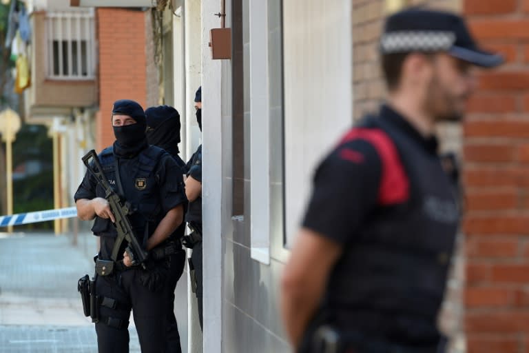 Officers searched the Algerian attacker's home, which was located just a few hundred metres (yards) from the police station