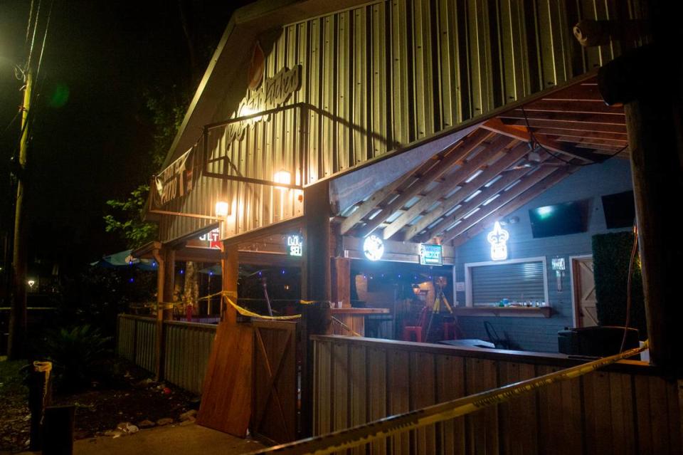 Crime scene tape surrounds The Scratch Kitchen restaurant in Ocean Springs after a shooting left 1 dead and several injured on Friday, May 5, 2023. Hannah Ruhoff/Sun Herald