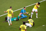 <p>David Ospina collects the ball after Senegal’s Sadio Mane is challenged by Davinson Sanchez </p>