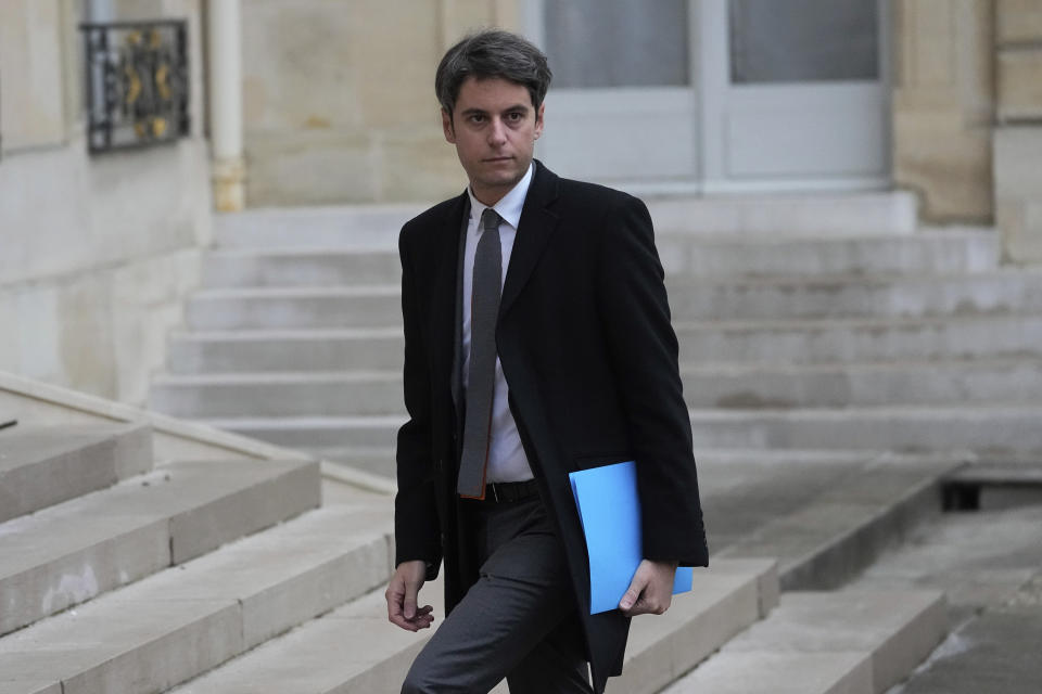 New French prime minister Gabriel Attal arrives to attend the weekly cabinet meeting after a cabinet reshuffle at the Elysee Palace in Paris, Friday, Jan. 12, 2024 . (AP Photo/Michel Euler)